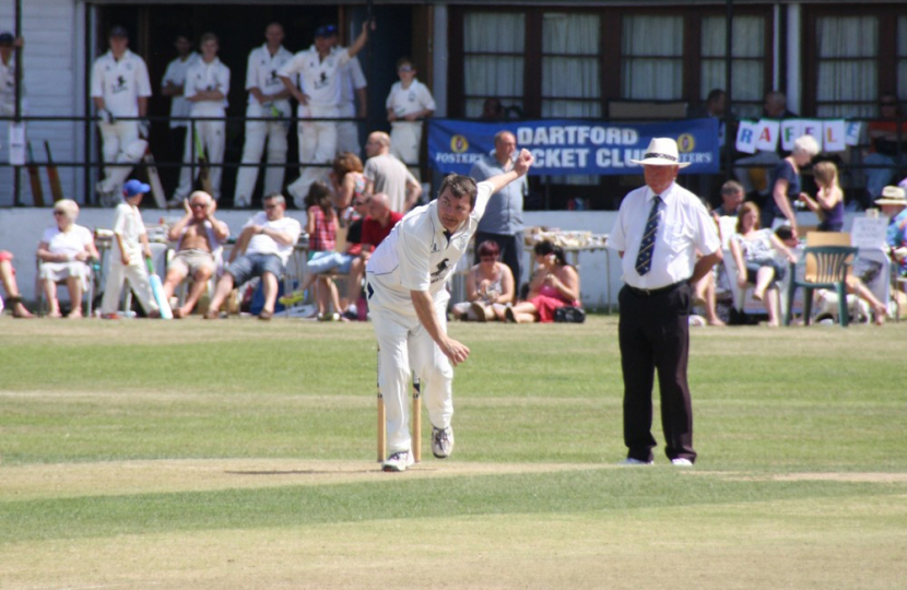 Gareth Johnson MP playing cricket